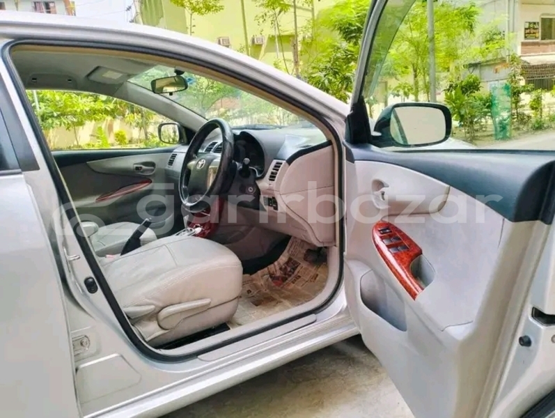 Big with watermark toyota axio kishorganj bajitpur 47025