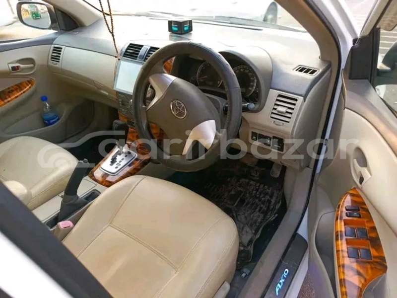 Big with watermark toyota axio 2015 kishorganj bajitpur 47703